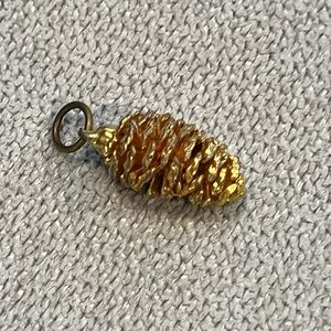 Gold dipped pine cone pendant